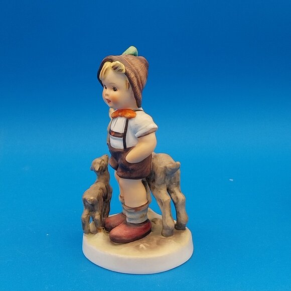 Hummel Sculpture of Child with Goats - Brown, Cream, and Red - Picture 2 of 7